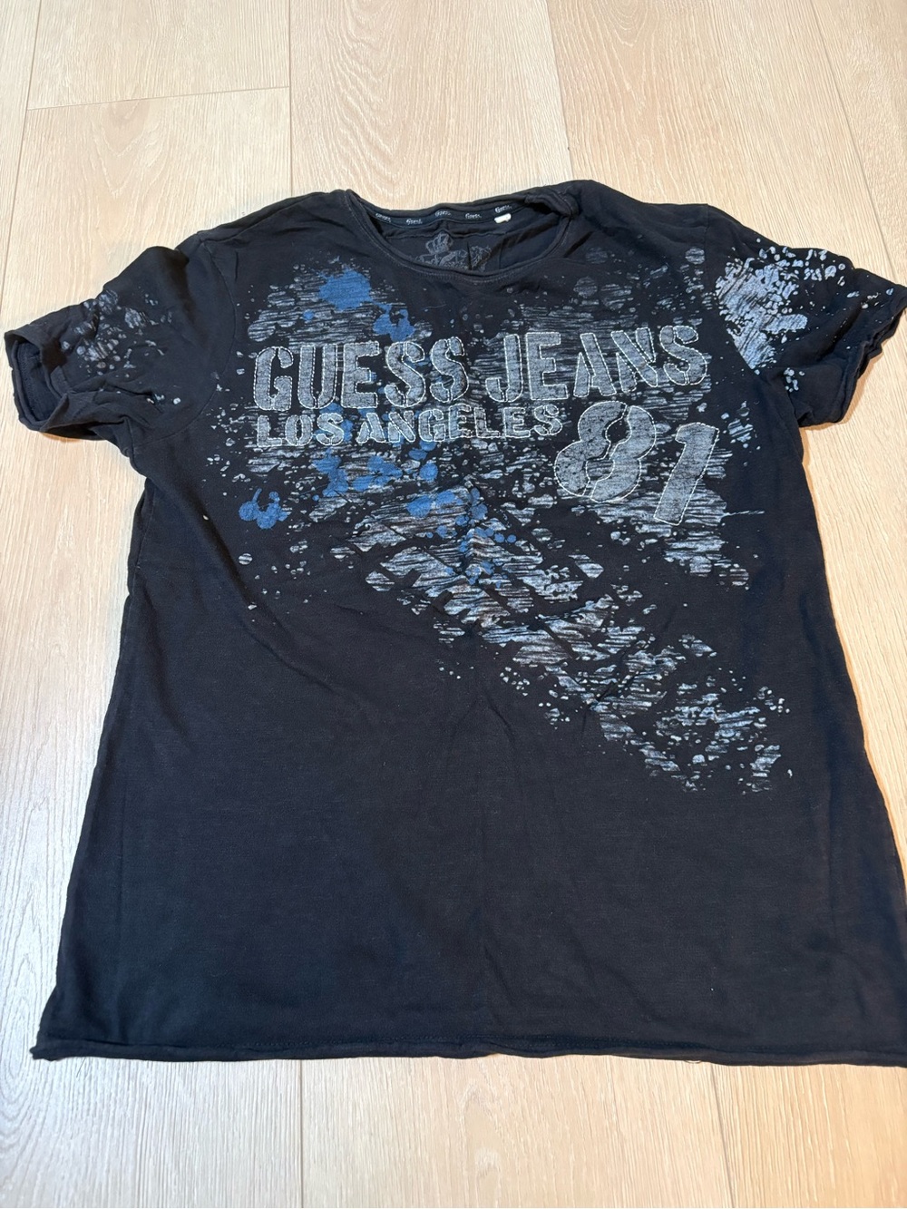 Guess Black T‑Shirt with Gray Crest and Blue Accents